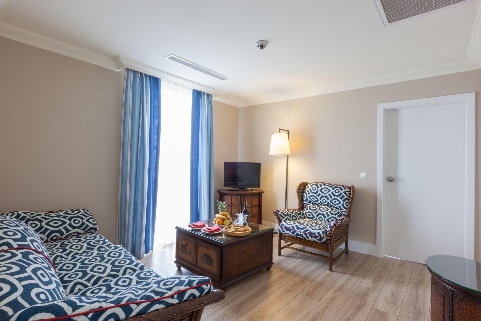 Ic Hotels Green Palace - Kids Concept Antalya Extérieur photo A living room at the hotel